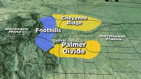 How much snow could fall in the foothills and Palmer Divide?